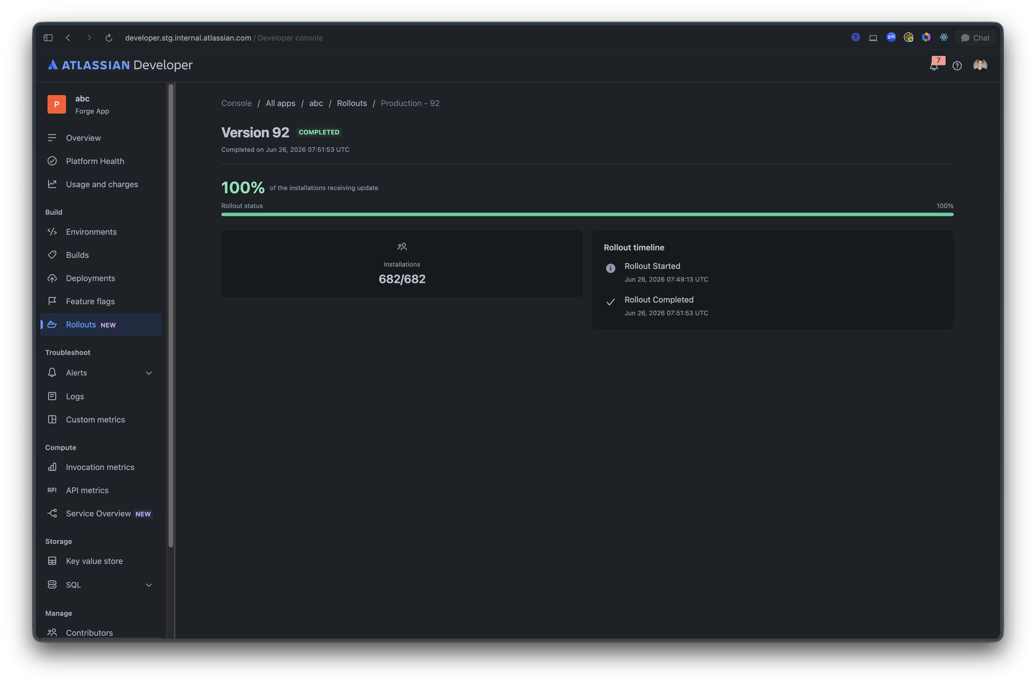Rollout details page showing in-progress rollout status, installation metrics, installation eligibility, ineligible versions, and rollout timeline